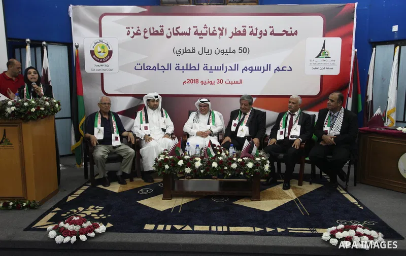 Qatar's Ambassador to the Palestinian Authority, Mohammed Al Emadi attends the ceremony of provide a grant to support the fees of Palestinian needy students at Al-Aqsa University, in Gaza city on June 30, 2018. Photo by...