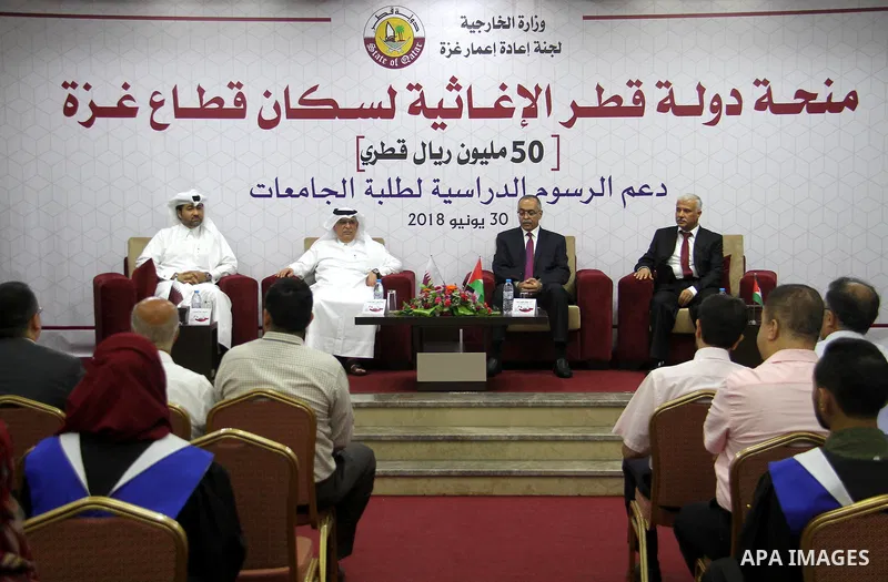 Qatar's Ambassador to the Palestinian Authority, Mohammed Al Emadi attends the ceremony of provide a grant to support the fees of Palestinian needy students at University College of Applied Sciences, in Gaza city on June...