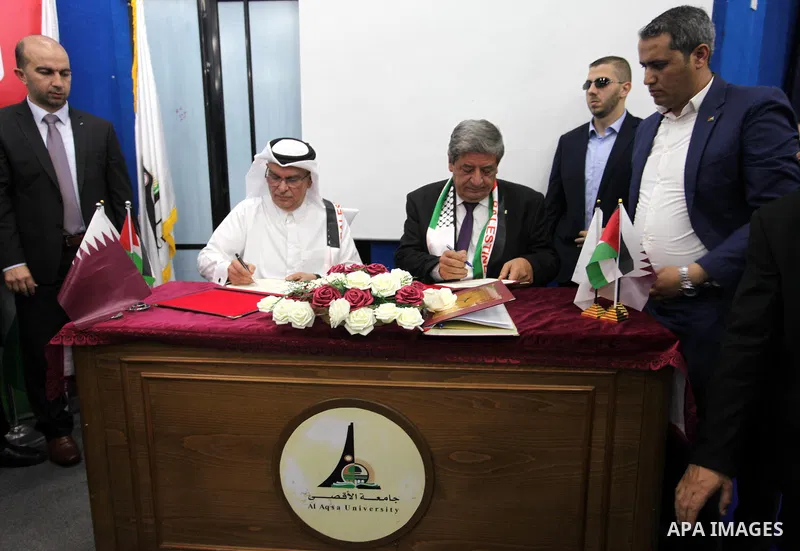 Qatar's Ambassador to the Palestinian Authority, Mohammed Al Emadi attends the ceremony of provide a grant to support the fees of Palestinian needy students at Al-Aqsa University, in Gaza city on June 30, 2018. Photo by...