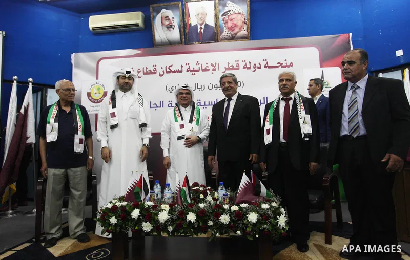 Qatar's Ambassador to the Palestinian Authority, Mohammed Al Emadi attends the ceremony of provide a grant to support the fees of Palestinian needy students at Al-Aqsa University, in Gaza city on June 30, 2018. Photo by...