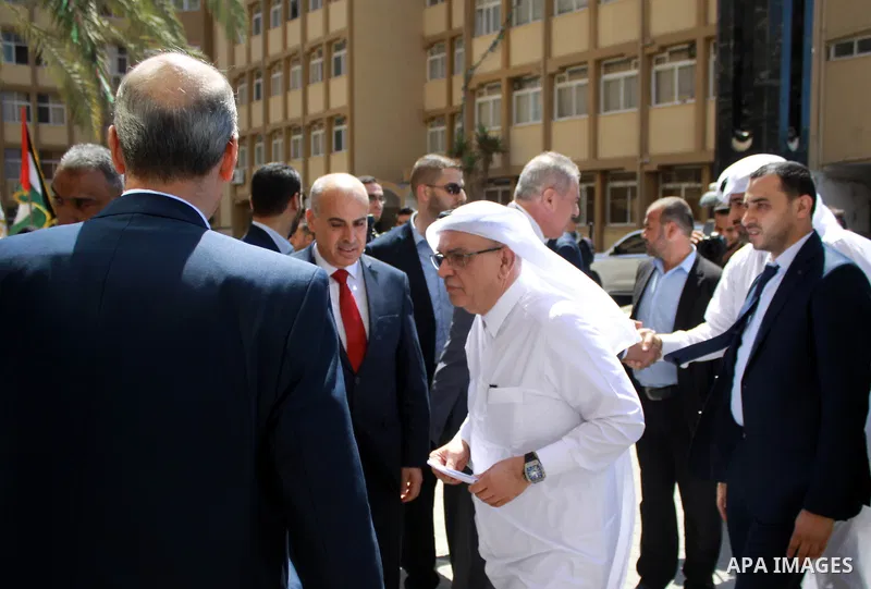Qatar's Ambassador to the Palestinian Authority, Mohammed Al Emadi attends the ceremony of provide a grant to support the fees of Palestinian needy students at Al-Azhar University, in Gaza city on June 30, 2018. Photo by...