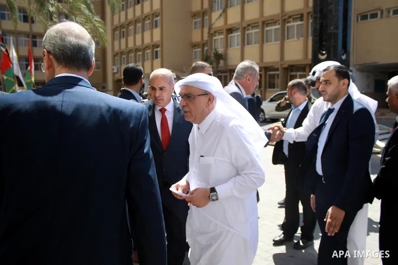 Qatar's Ambassador to the Palestinian Authority, Mohammed Al Emadi attends the ceremony of provide a grant to support the fees of Palestinian needy students at Al-Azhar University, in Gaza city on June 30, 2018. Photo by...