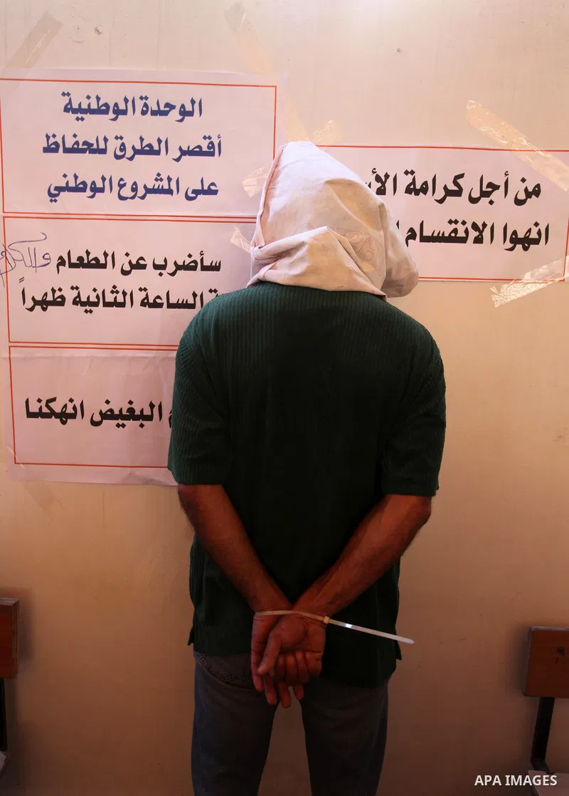 Palestinians take part in a protest to show solidarity with Palestinian prisoners held in Israeli jails, in front of Red cross office in Gaza city on July 2, 2018. Photo by Mahmoud Ajour