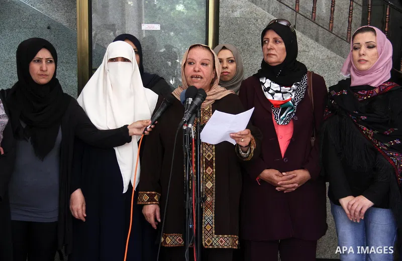 Coordinator of the Women's Committee in tthe National commission for the great return march and break Gaza siege, Ektemal Hamad speaks during a press conference, in Gaza city, on July 2, 2018. Photo by Mahmoud Ajour
