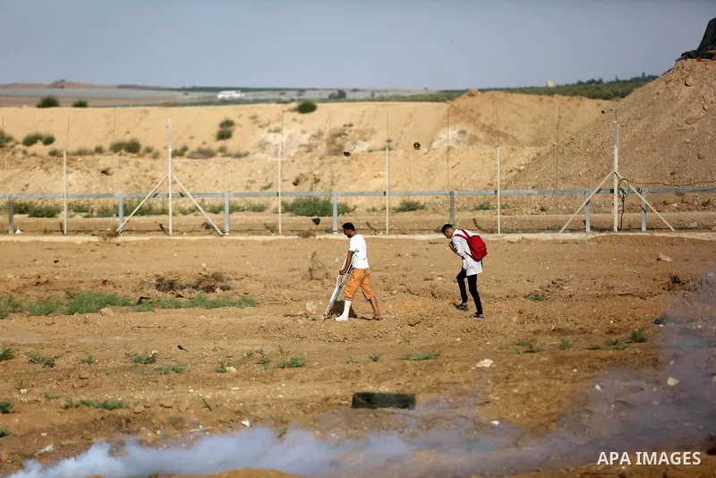 Protesters gather during a protest by Palestinian women where Palestinians demand the right to return to their homeland along the border with Israel east of Gaza City on July 3, 2018. Photo by Ashraf Amra