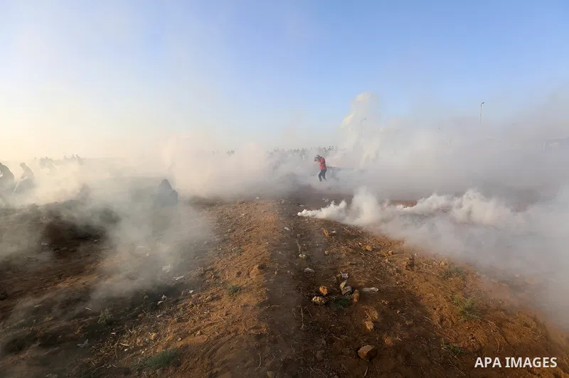 Protesters gather during a protest by Palestinian women where Palestinians demand the right to return to their homeland along the border with Israel east of Gaza City on July 3, 2018. Photo by Atia Darwish