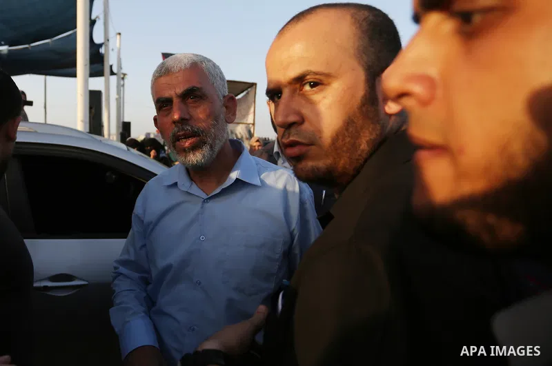 Hamas's leader in the Gaza Strip Yahya Sinwar participates during a protest by Palestinian women where Palestinians demand the right to return to their homeland along the border with Israel east of Gaza City on July 3, 2...