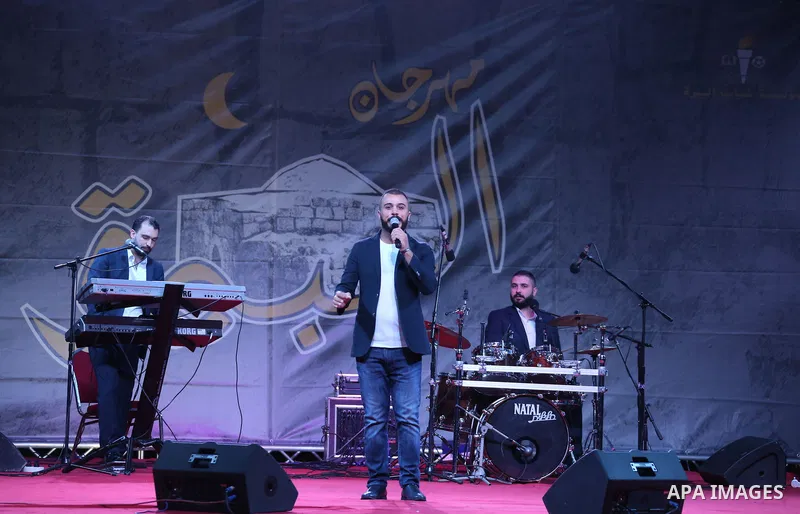 Jordanian singer Hussein Salman performs during a concert at al-Bireh Festival, in the West Bank city Bireh, on July 3, 2018. Photo by Shadi Hatem