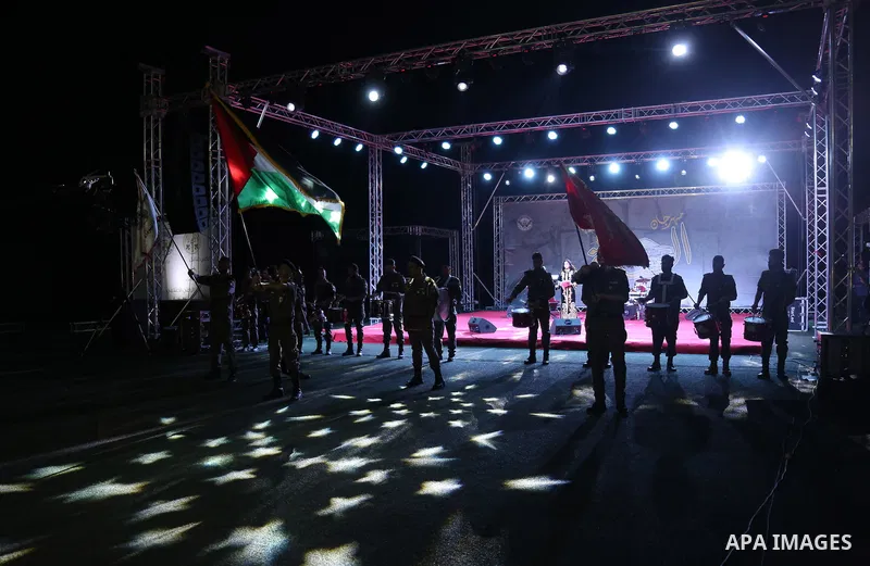 Palestinians attend a concert by Jordanian singer Hussein Salman at al-Bireh Festival, in the West Bank city Bireh, on July 3, 2018. Photo by Shadi Hatem