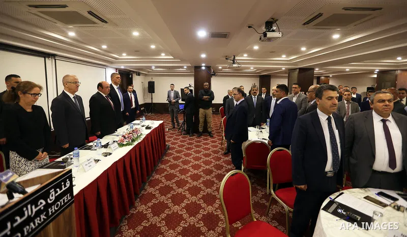 Palestinian Prime Minister, Rami Hamdallah, attends the launch of the report of the national team to assess the risks of the crimes of money laundering and terrorist financing, in the West bank city of Ramallah, on July...