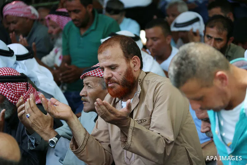 Palestinians perform Friday prayers before a demonstration against Israel at the Palestinian Bedouin village of Khan al-Ahmar, east of Jerusalem in the occupied West Bank on July 6, 2018. Israel's Supreme Court has tempo...