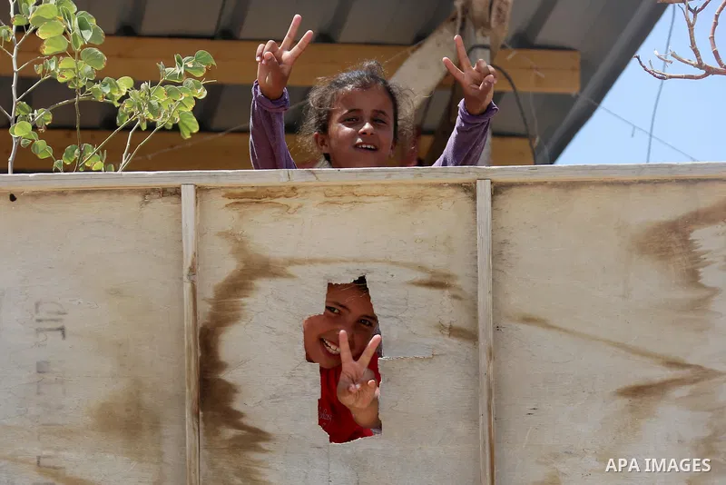 Palestinian children play at the Palestinian Bedouin village of Khan al-Ahmar, east of Jerusalem in the occupied West Bank on July 6, 2018. Israel's Supreme Court has temporarily blocked the demolition of a Palestinian B...