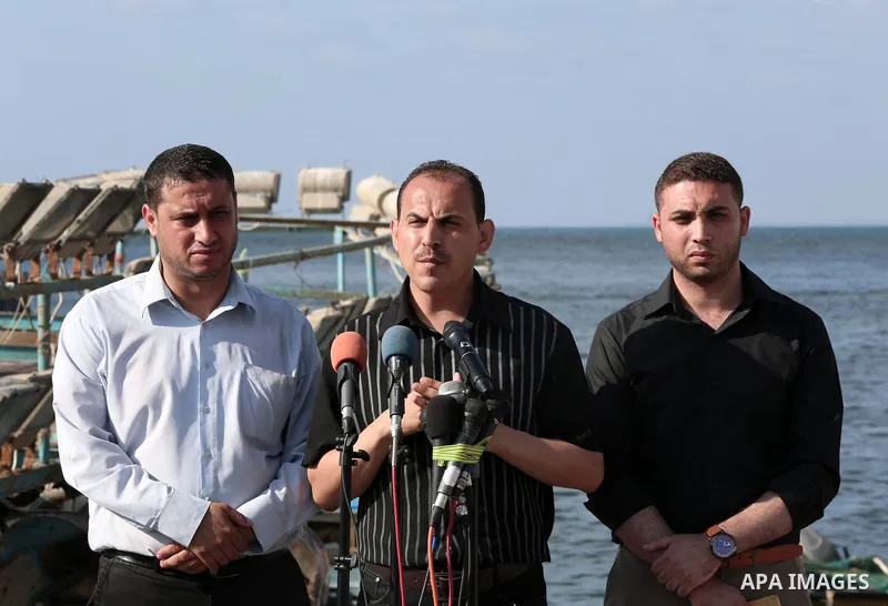 A Palestinian member of the supreme commission for the "Great Return March" and breaking the siege speaks during a press conference, at Gaza City harbour, on July 10, 2018. Israel’s navy announced today that it had seize...
