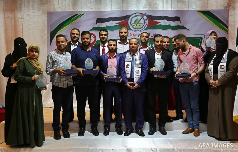 Palestinians attend the honoring ceremony of Palestinian journalists, in Gaza city on July 12, 2018. Photo by Mahmoud Ajour