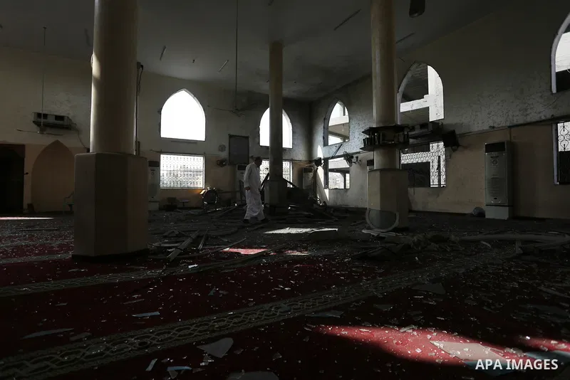 Palestinians inspect a mosque that was damaged in an Israeli airstrike on the Gaza City, on July 15, 2018. Israel's military said it had launched air strikes targeting Hamas in the Gaza Strip on July 14, as rockets and m...