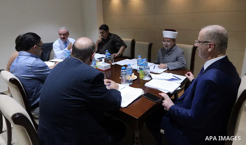 Palestinian Prime Minister, Rami Hamdallah, chairs a meeting of the High Committee for Jerusalem, in the West bank city of Ramallah, on July 15, 2018. Photo by Prime Minister Office