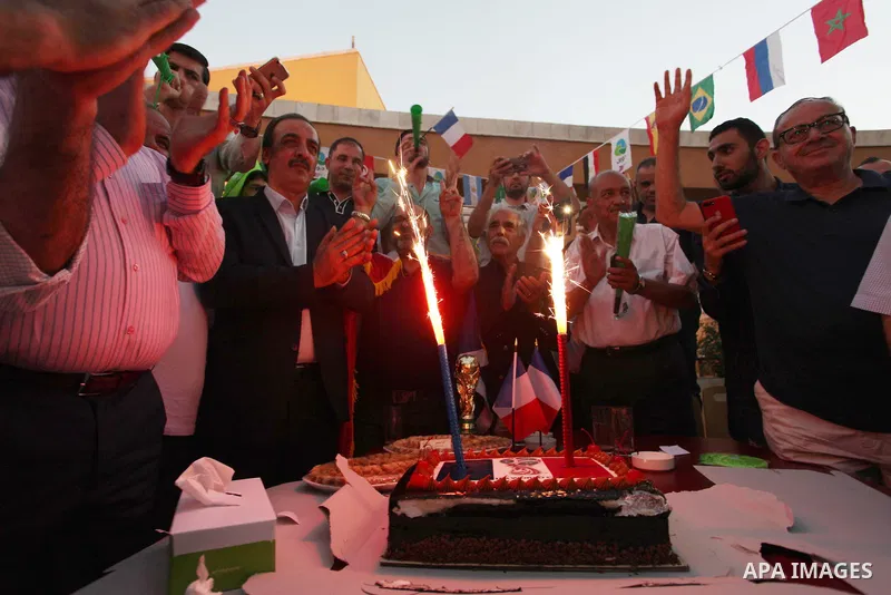 Palestinians celebrate after the 2018 FIFA World Cup final match between France and Croatia at the French Cultural Center in Gaza city, on July 15, 2018. France defeated Croatia 4-2 and claimed the title. Photo by Mahmou...