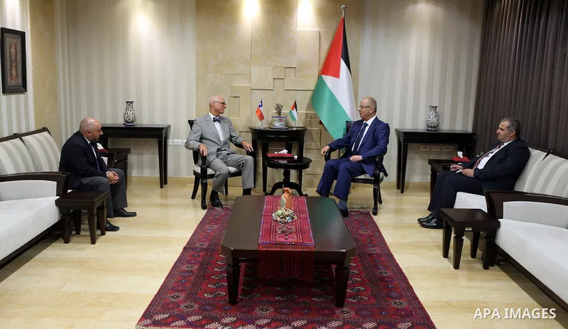 Palestinian Prime Minister, Rami Hamdallah, meets with Chilean Ambassador to the State of Palestine, Francisco Bernales in the West Bank city of Ramallah, on July 16, 2018. Photo by Prime Minister Office