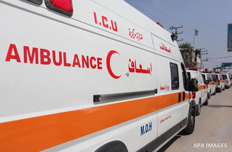Palestinian ambulance drivers take part in a protest against the siege on the Gaza Strip, outside Indonesian hospital, in the northern of Gaza Strip on July 17, 2018. Photo by Mahmoud Ajour