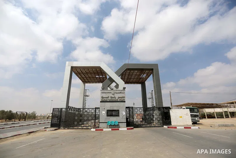 Palestinian security forces loyal to the Palestinian Authority stand at the Rafah border crossing with Egypt in the southern Gaza Strip on July 17, 2018. Israel further tightened its blockade of the Gaza Strip preventing...
