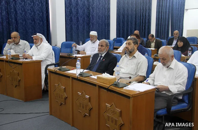 Members of the Palestinian legislative council from Hamas movement attend a meeting at the legislative council, in Gaza city on July 18, 2018. Photo by Mahmoud Ajour