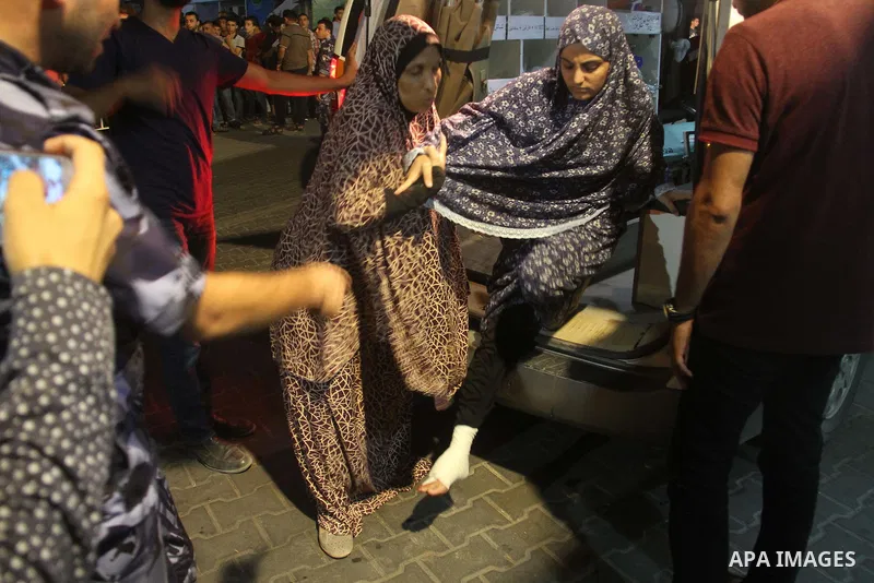 A Palestinian man who was wounded by Israeli troops during clashes at the Israel-Gaza border, in a tent city protest where Palestinians demand the right to return to their homeland, receives treatment at al-Shifa hospita...