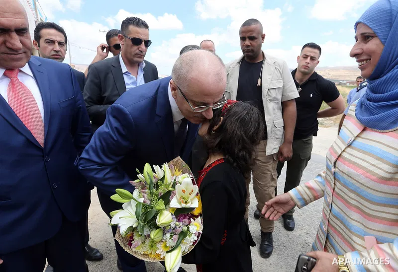 Palestinian Prime Minister, Rami Hamdallah, attends the opening ceremony of Tana Street at the Bet Forik village near the West Bank city of Nablus on July 21, 2018. Photo by Prime Minister Office