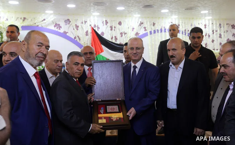 Palestinian Prime Minister, Rami Hamdallah, attends the opening ceremony of Tana Street at the Bet Forik village near the West Bank city of Nablus on July 21, 2018. Photo by Prime Minister Office