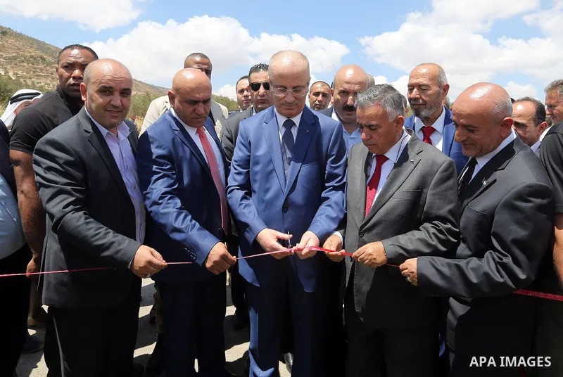 Palestinian Prime Minister, Rami Hamdallah, attends the opening ceremony of Tana Street at the Bet Forik village near the West Bank city of Nablus on July 21, 2018. Photo by Prime Minister Office