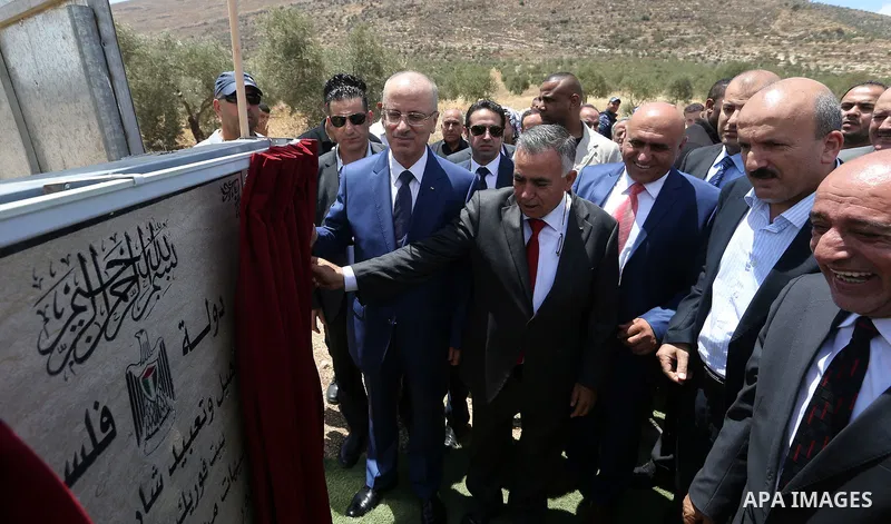 Palestinian Prime Minister, Rami Hamdallah, attends the opening ceremony of Tana Street at the Bet Forik village near the West Bank city of Nablus on July 21, 2018. Photo by Prime Minister Office