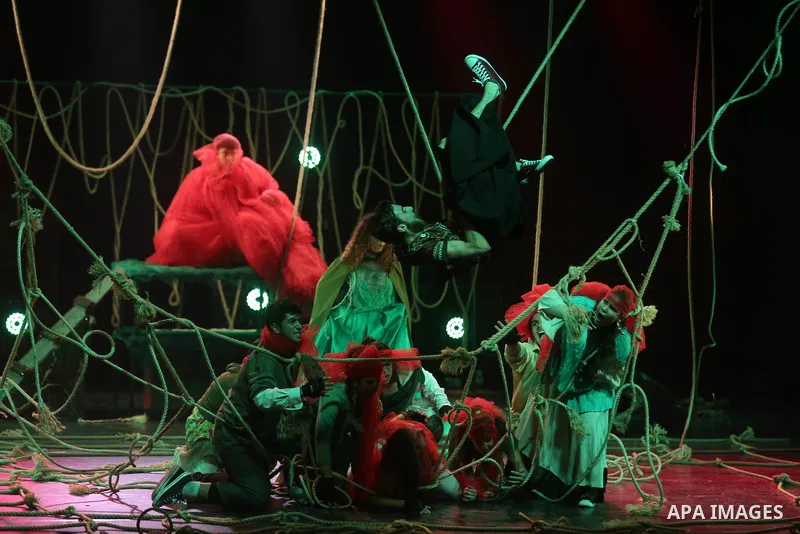 Palestinian actors perform in a play on a stage during the opening of the fourth Ishtar International Festival in the West Bank city of Ramallah, on July 21, 2018. Photo by Shadi Hatem