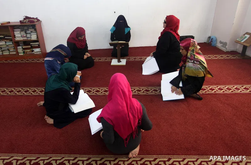 Palestinian blind boys read and memorise the holy Quran in braille at Dar al-Quran and Sunnah in Gaza city, on July 23, 2018. Photo by Mahmoud Ajour