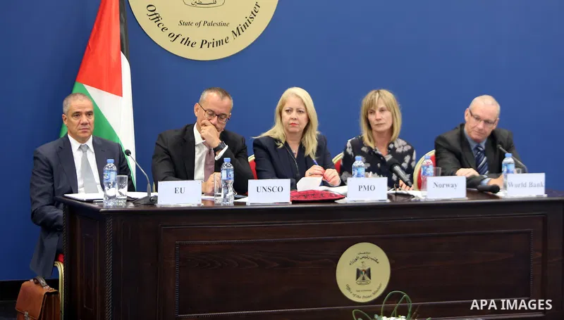 Advisor to Palestinian Prime Minister, Khairia Rasas chairs a meeting of donor countries ways to support the budget and "UNRWA" and the implementation of development projects in Gaza and the West Bank, in the West Bank c...