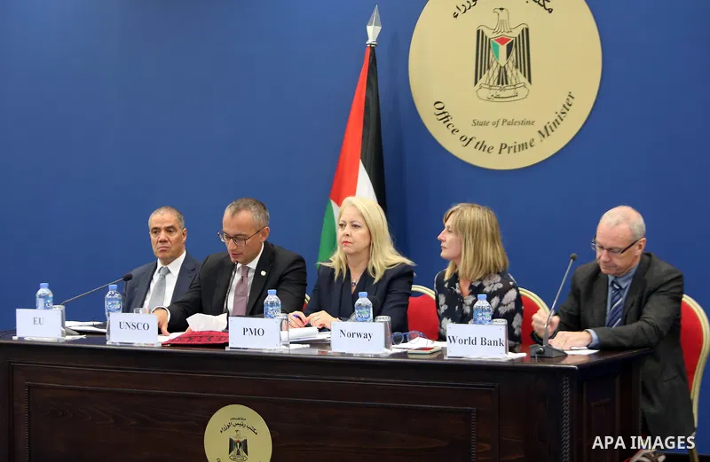 Advisor to Palestinian Prime Minister, Khairia Rasas chairs a meeting of donor countries ways to support the budget and "UNRWA" and the implementation of development projects in Gaza and the West Bank, in the West Bank c...