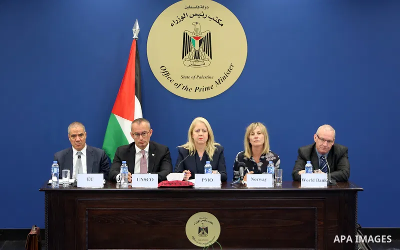 Advisor to Palestinian Prime Minister, Khairia Rasas chairs a meeting of donor countries ways to support the budget and "UNRWA" and the implementation of development projects in Gaza and the West Bank, in the West Bank c...