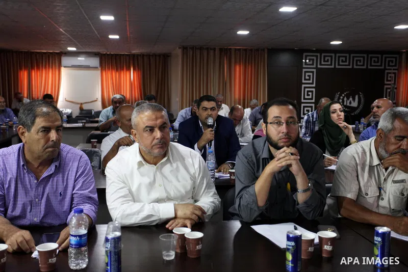 Palestinian members of the National commission for the great return march and break Gaza siege, take part in a press conference with the Ministry of Health, the Gaza City, on July 23, 2018. Photo by Mahmoud Ajour
