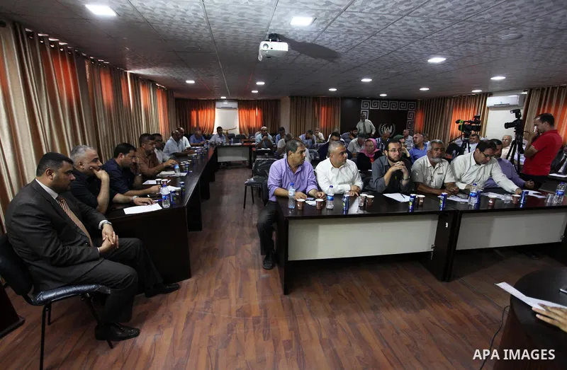 Palestinian members of the National commission for the great return march and break Gaza siege, take part in a press conference with the Ministry of Health, the Gaza City, on July 23, 2018. Photo by Mahmoud Ajour