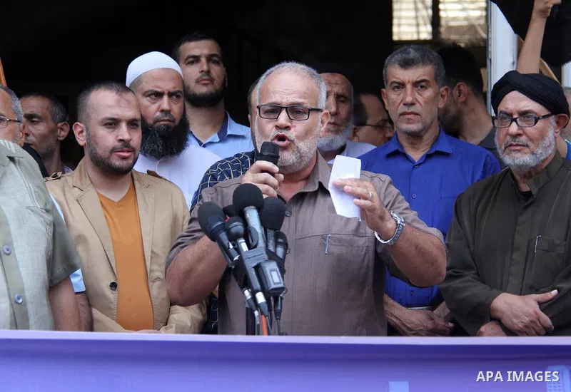 Palestinian supporters of Islamic Jihad movement take part during a protest to show solidarity with Al-Aqsa mosque, in Gaza city, on July 23, 2018. Photo by Mahmoud Ajour