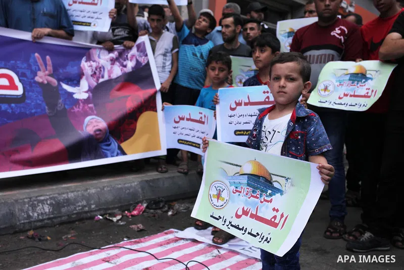 Palestinian supporters of Islamic Jihad movement take part during a protest to show solidarity with Al-Aqsa mosque, in Gaza city, on July 23, 2018. Photo by Mahmoud Ajour