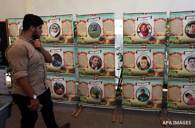 Palestinians attend an exhibition for the "Great Return March", in Gaza City on July 24, 2018. Photo by Mahmoud Ajour