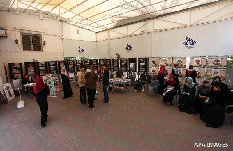 Palestinians attend an exhibition for the "Great Return March", in Gaza City on July 24, 2018. Photo by Mahmoud Ajour