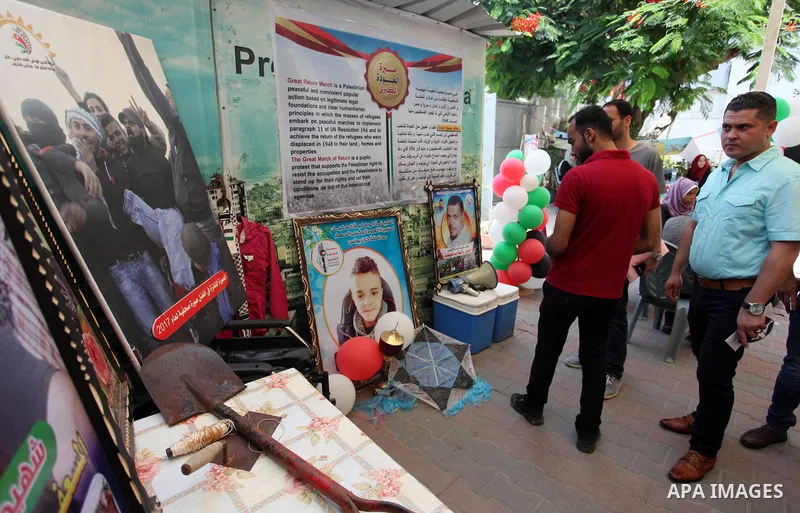 Palestinians attend an exhibition for the "Great Return March", in Gaza City on July 24, 2018. Photo by Mahmoud Ajour