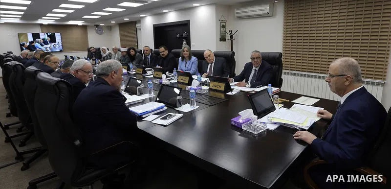 Palestinian Prime Minister Rami Hamdallah chairs a meeting with council of Ministers in the West Bank city of Ramallah on July 24, 2018. Photo by Prime Minister Office