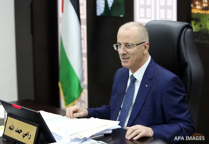 Palestinian Prime Minister Rami Hamdallah chairs a meeting with council of Ministers in the West Bank city of Ramallah on July 24, 2018. Photo by Prime Minister Office