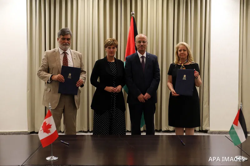 Palestinian Prime Minister, Rami Hamdallah, meets with Canadian International Development Minister Marie-Claude Bebo, in the West Bank city of Ramallah, on July 26, 2018. Photo by Prime Minister Office