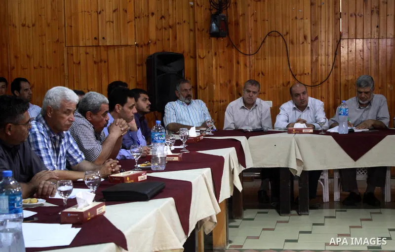 Palestinian faction members attend a meeting in Gaza city, on July 26, 2018. Photo by Bashar Zakri