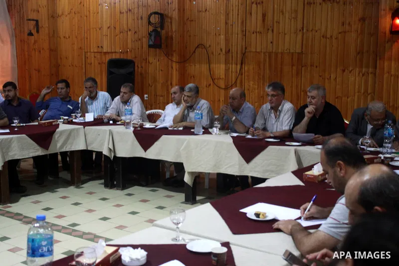 Palestinian faction members attend a meeting in Gaza city, on July 26, 2018. Photo by Bashar Zakri