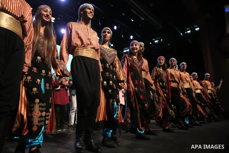 Palestinian Asayel band of folk art, perform during a show on the stage in the West Bank city of Ramallah, on June 26, 2018. Photo by Shadi Hatem