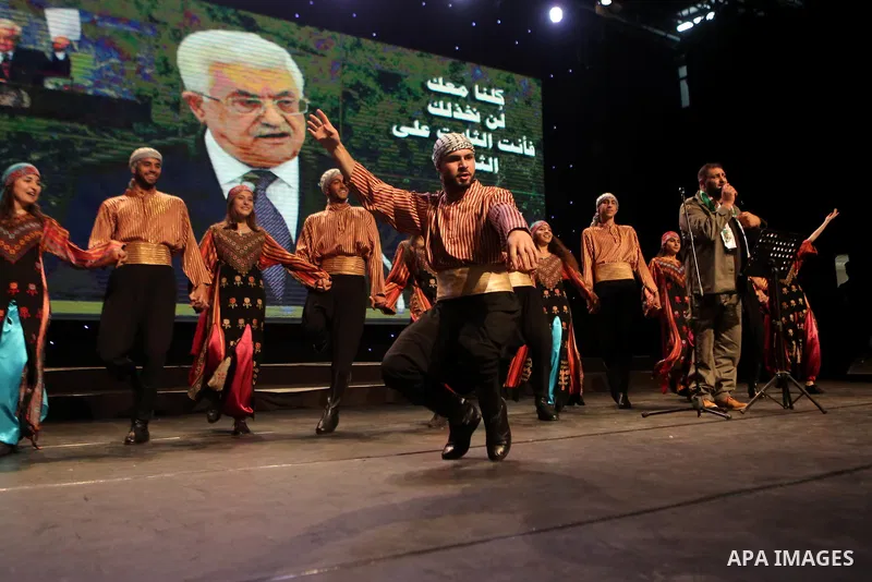 Palestinian Asayel band of folk art, perform during a show on the stage in the West Bank city of Ramallah, on June 26, 2018. Photo by Shadi Hatem
