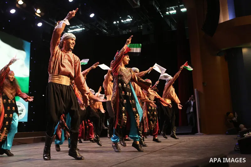 Palestinian Asayel band of folk art, perform during a show on the stage in the West Bank city of Ramallah, on June 26, 2018. Photo by Shadi Hatem